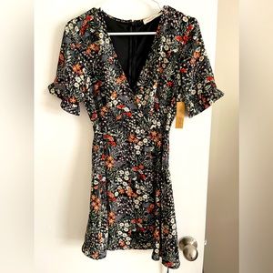 Rokoko dress. Base is navy with multi colored flowers. Size small